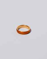 Enamel Band in Sunkist on light color background.