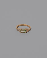 Bicolor Garnet Expression Ring on light color background.