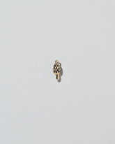 Morel Mushroom Charm on light color background.