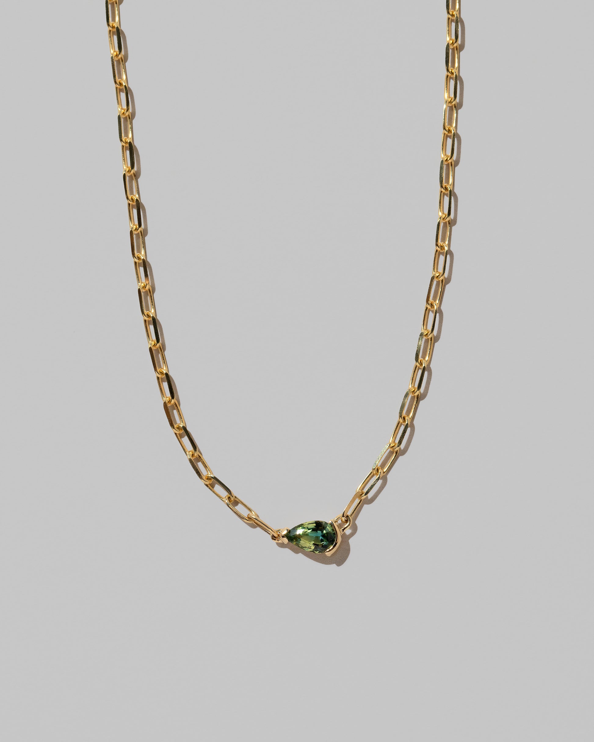 Closeup details of the Northern Lights Necklace 003 on light color background.