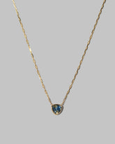Closeup details of the Northern Lights Necklace 004 on light color background.