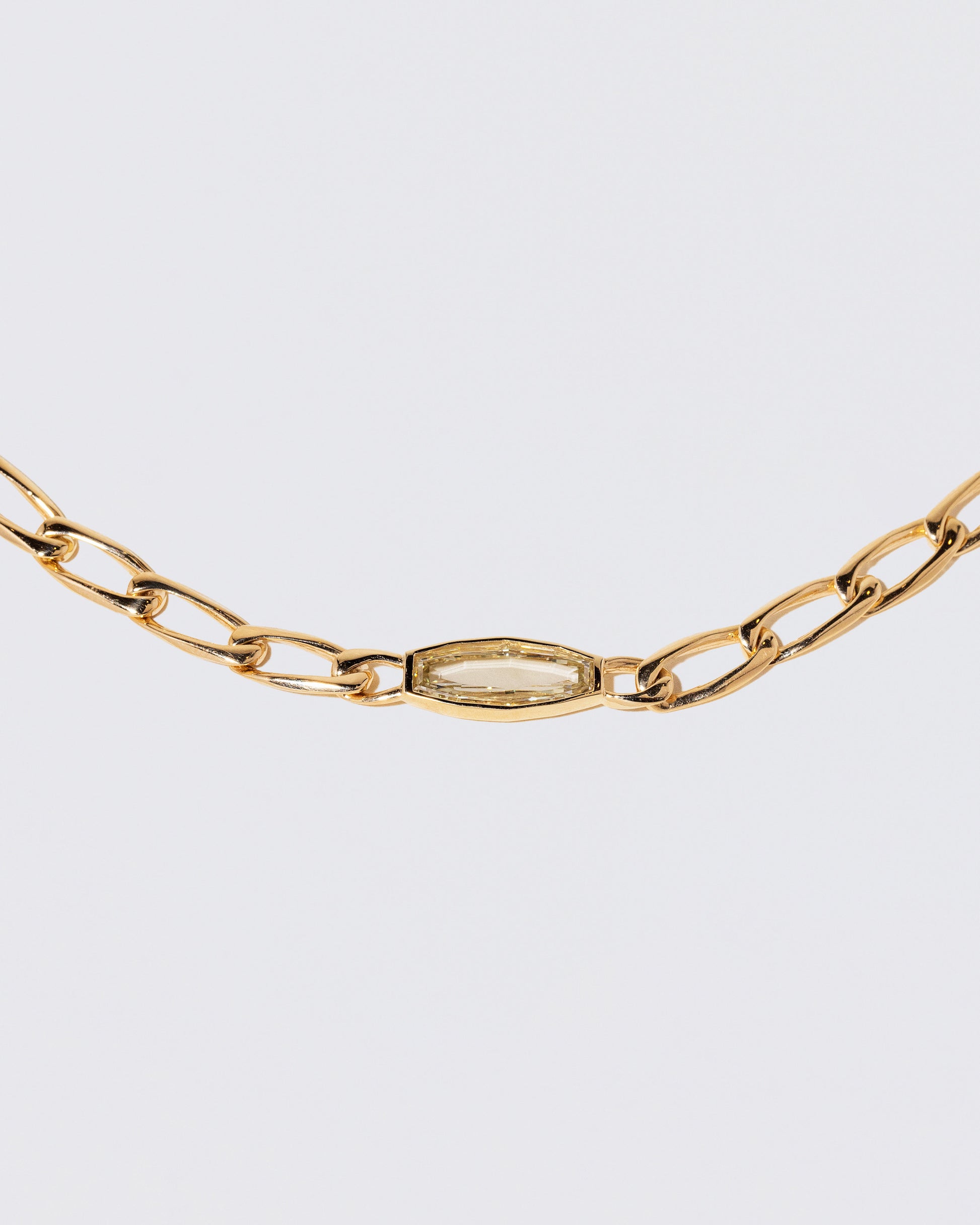 Closeup details of the Identity Chain Diamond Necklace 002 on light color background.