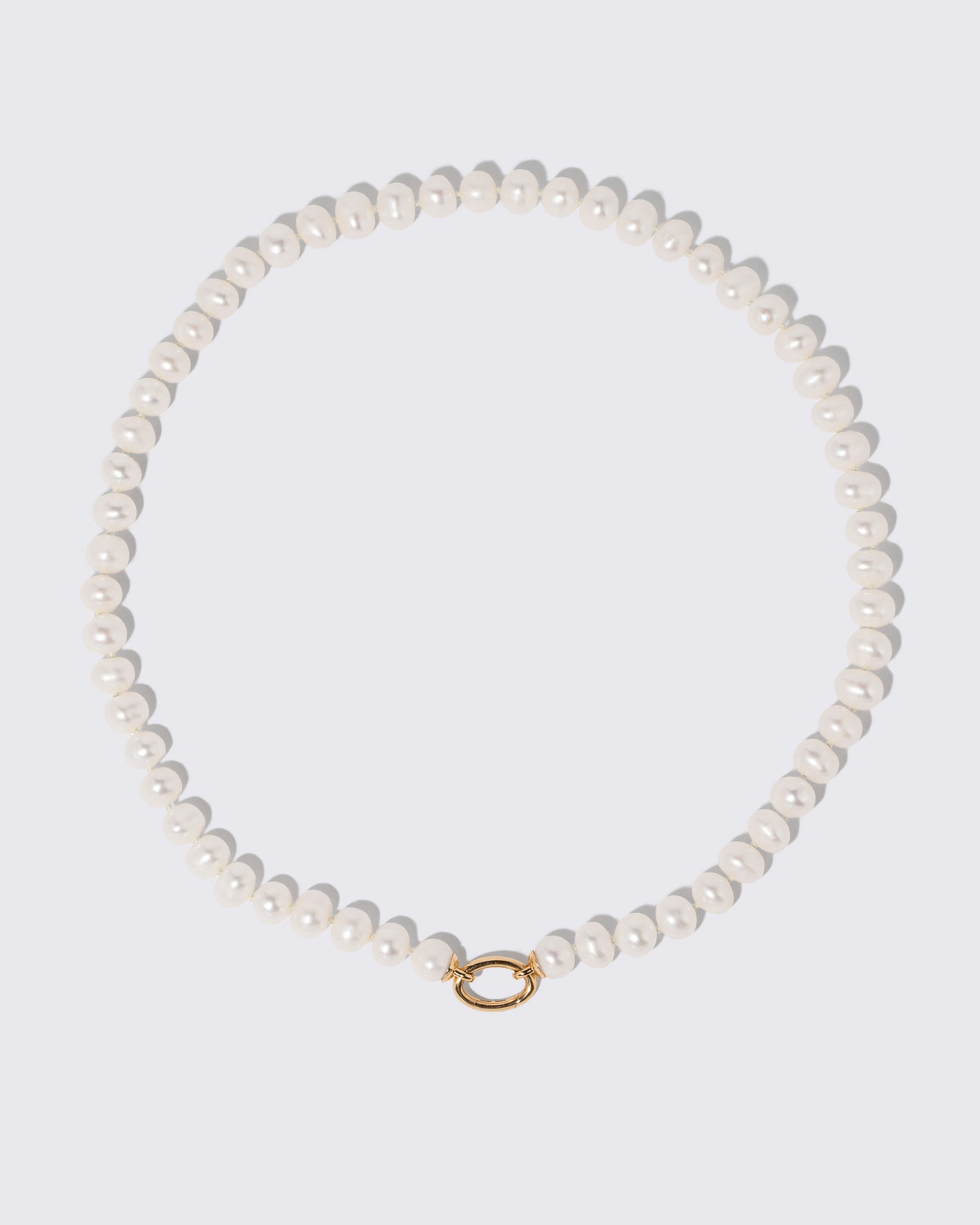 Platinum Pearl Openable Link Necklace and Gold Pearl Openable Link Necklace on light color background.