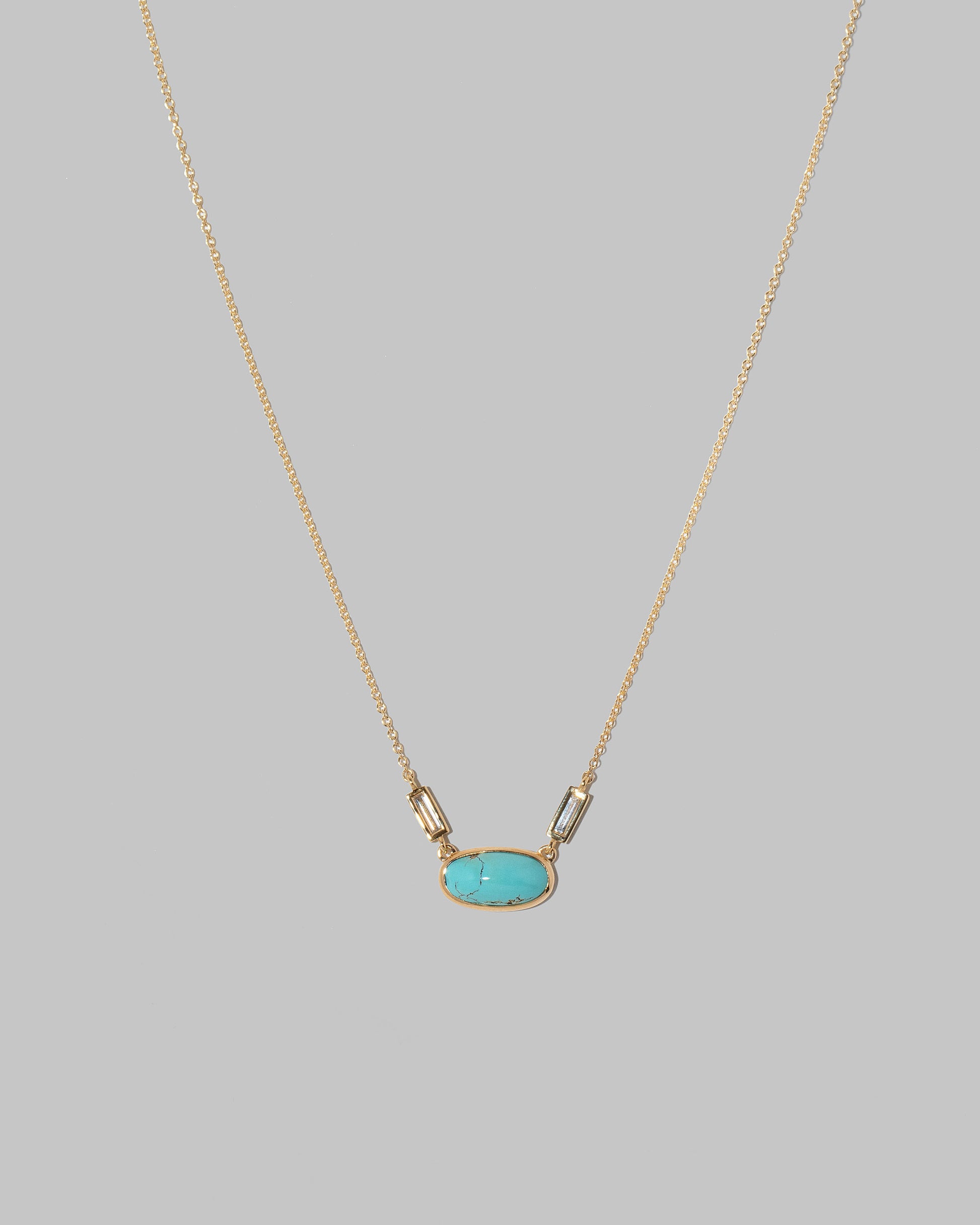 Closeup details of the Thar Necklace on light color background.