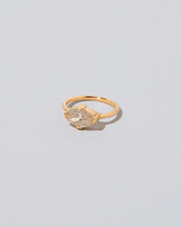 View from the side of the Eupheme Ring on light color background.
