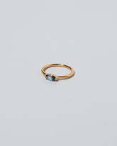 View from the side of the Blue Devant Ring on light color background.