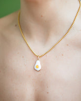 Vintage Ball Chain Necklace and Fried Egg Pendant on model.