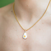 product_details::Vintage Ball Chain Necklace and Fried Egg Pendant on model.