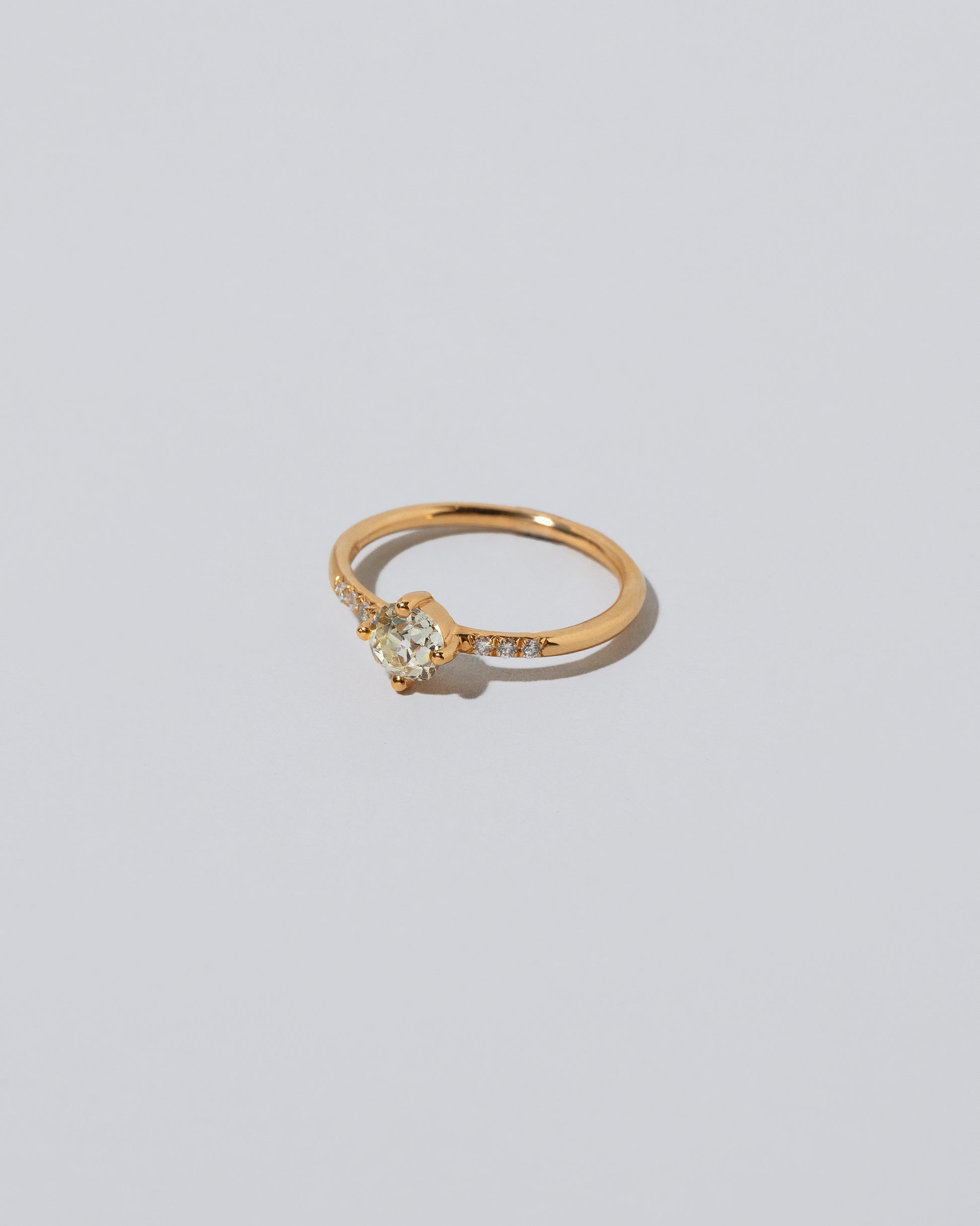 Compass Rose Ring on light color background.