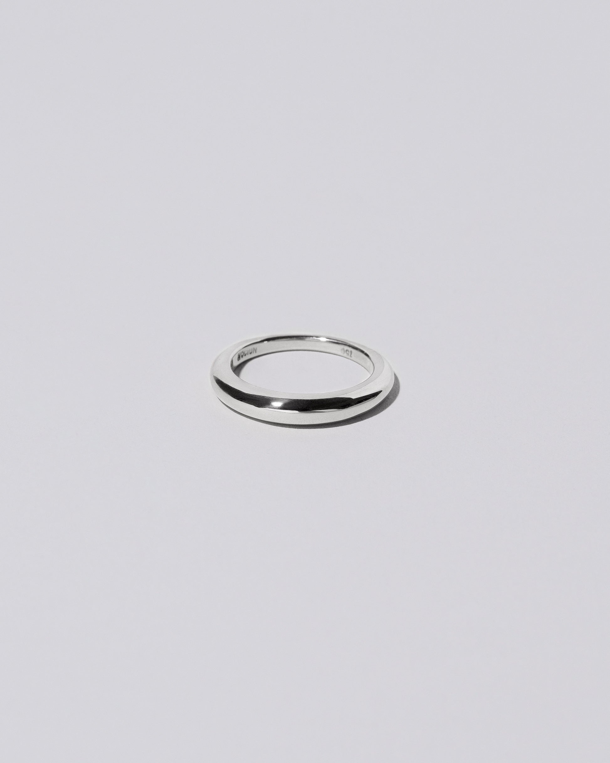Platinum 3.5mm Venus Band on light color background.