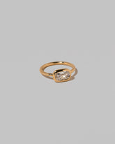 View from the side of the Gusher Diamond Ring 017 on light color background.
