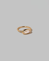 View from the side of the Gusher Diamond Ring 019 on light color background.