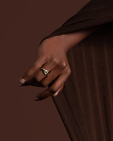 Styled image featuring the Coil Ring on model.