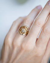 Diamond Level Ring, Gold Align Band and Gold Thin Planate Band stack on model.