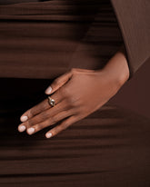 Styled image featuring the Twist Ring on model.