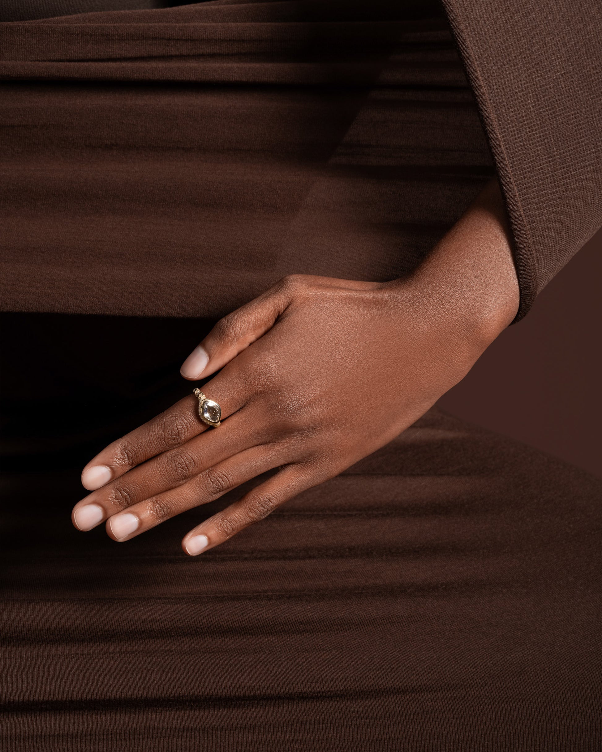 Styled image featuring the Twist Ring on model.