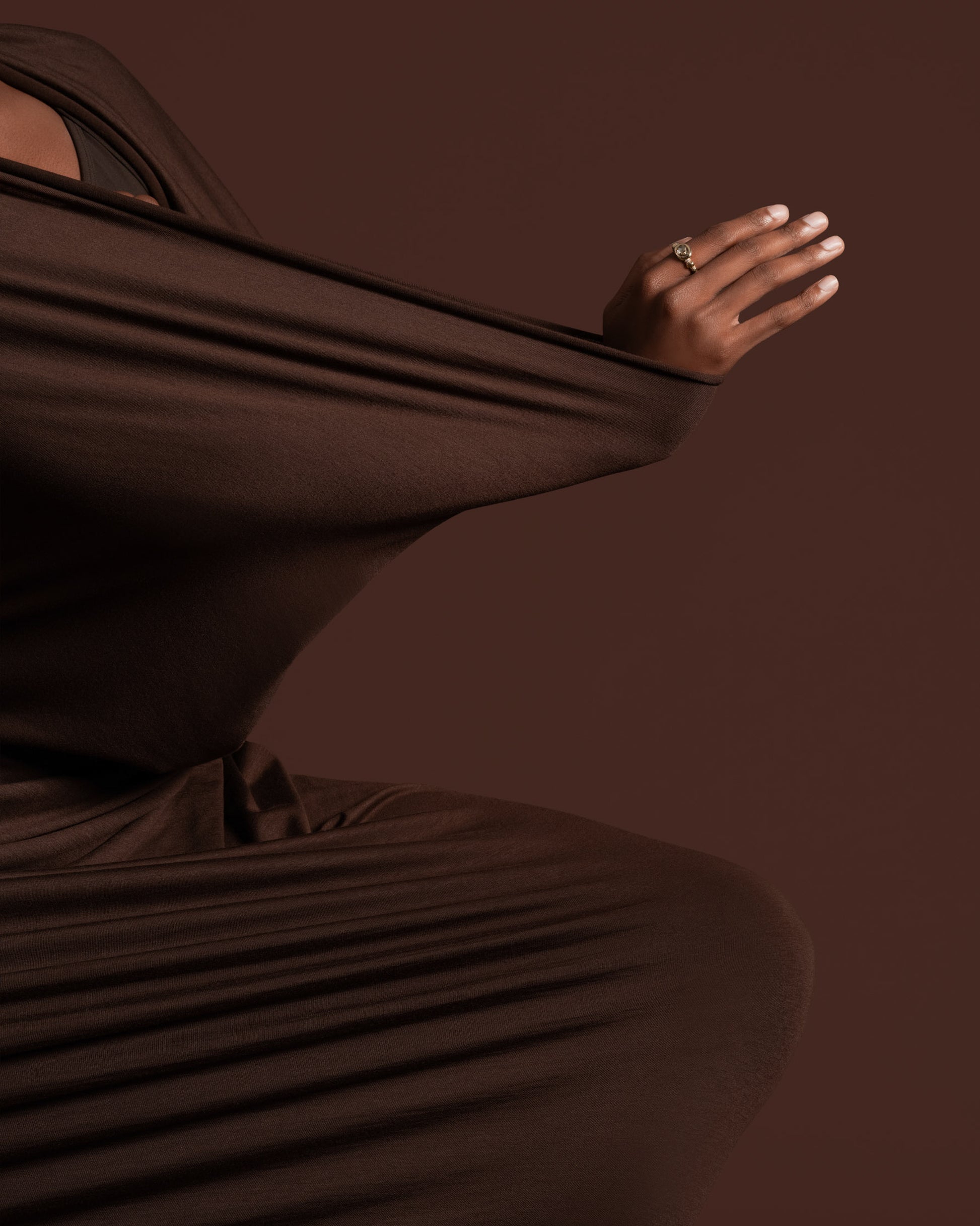 Styled image featuring the Wrapped Ring on model.