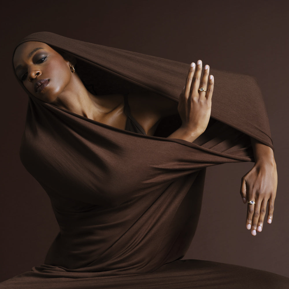 product_details::Styled image featuring the Entwine Ring and Twist Ring on model.
