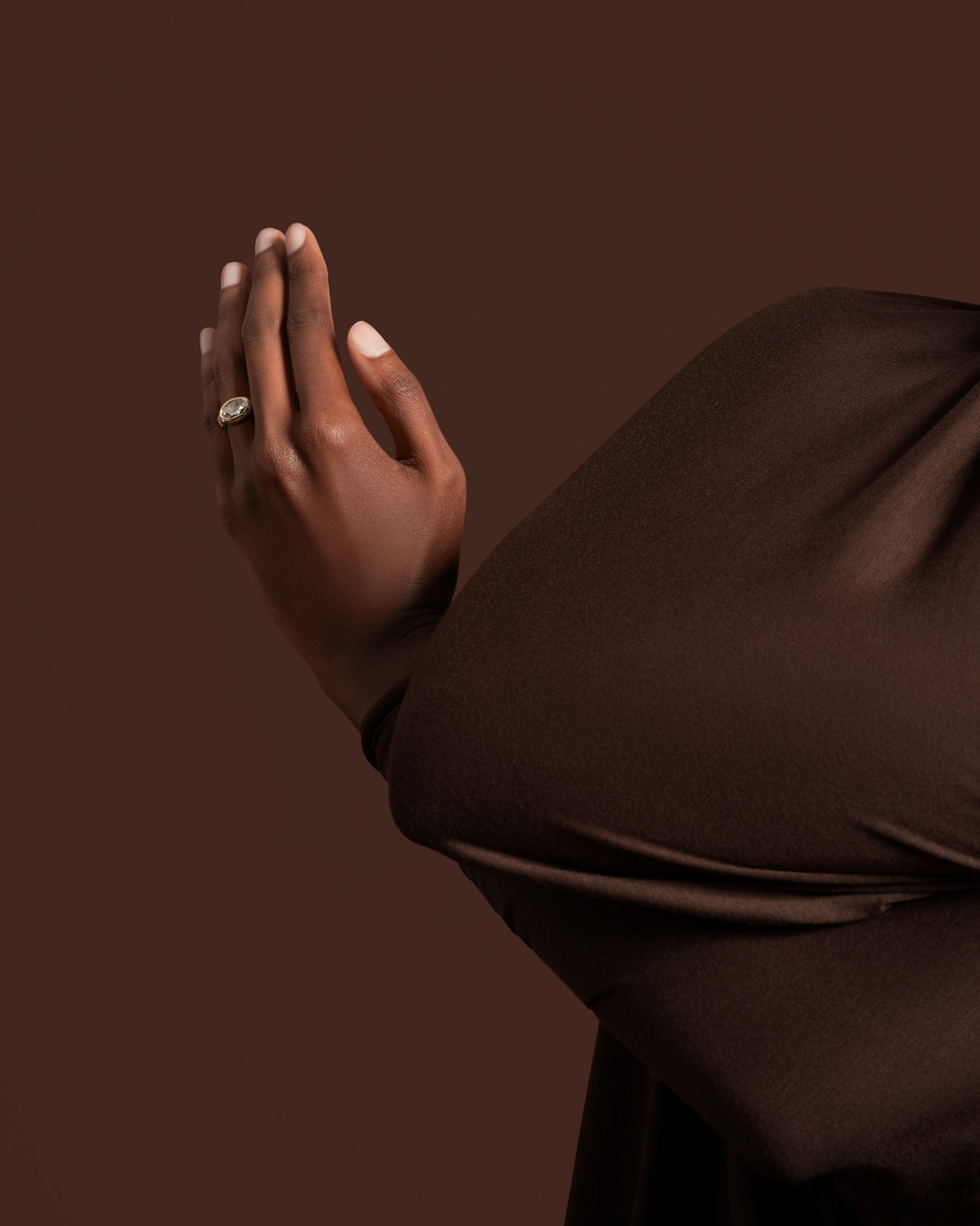 Styled image featuring the Contort Ring on model.