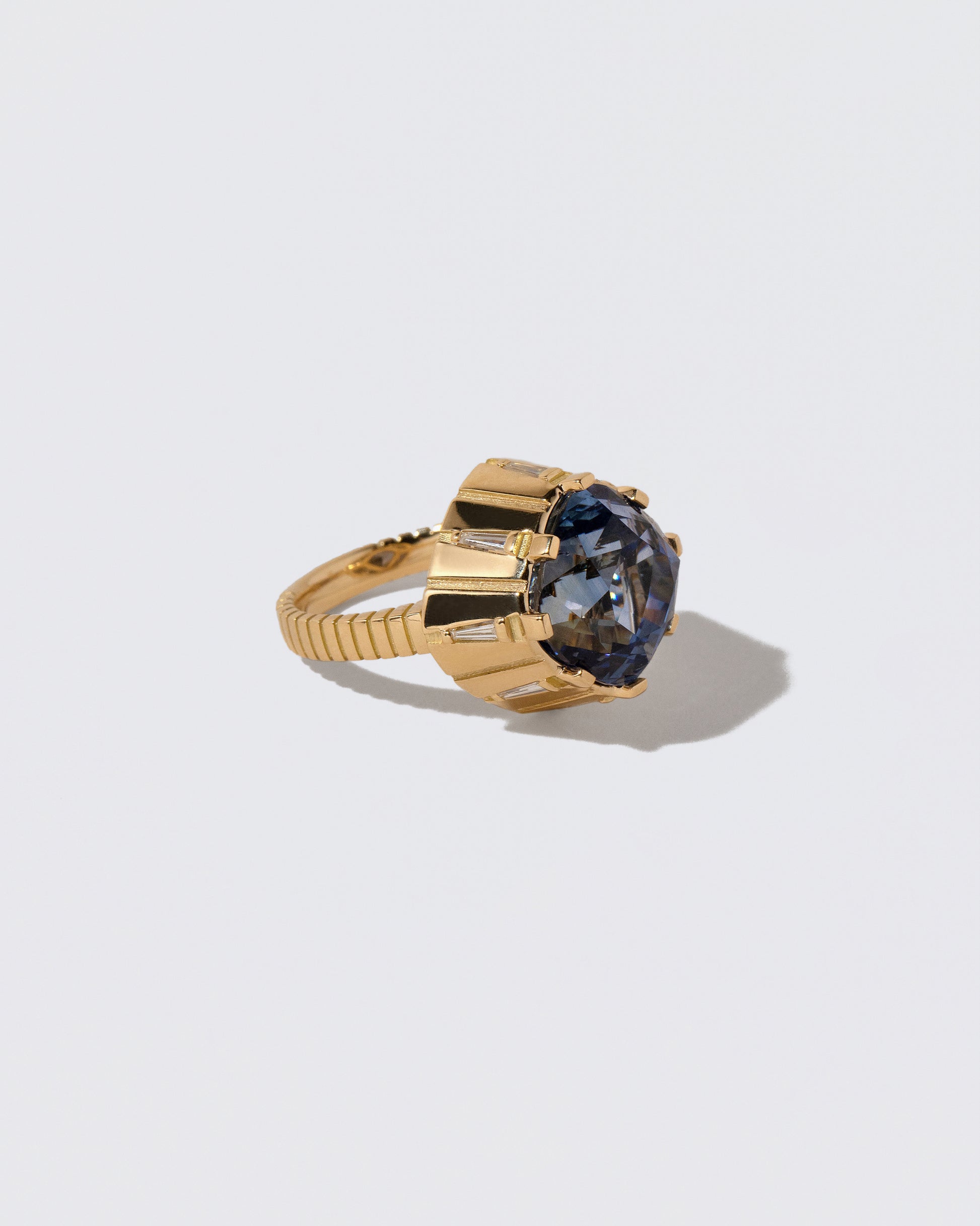 View from the side of the Alluim Ring on light color background.