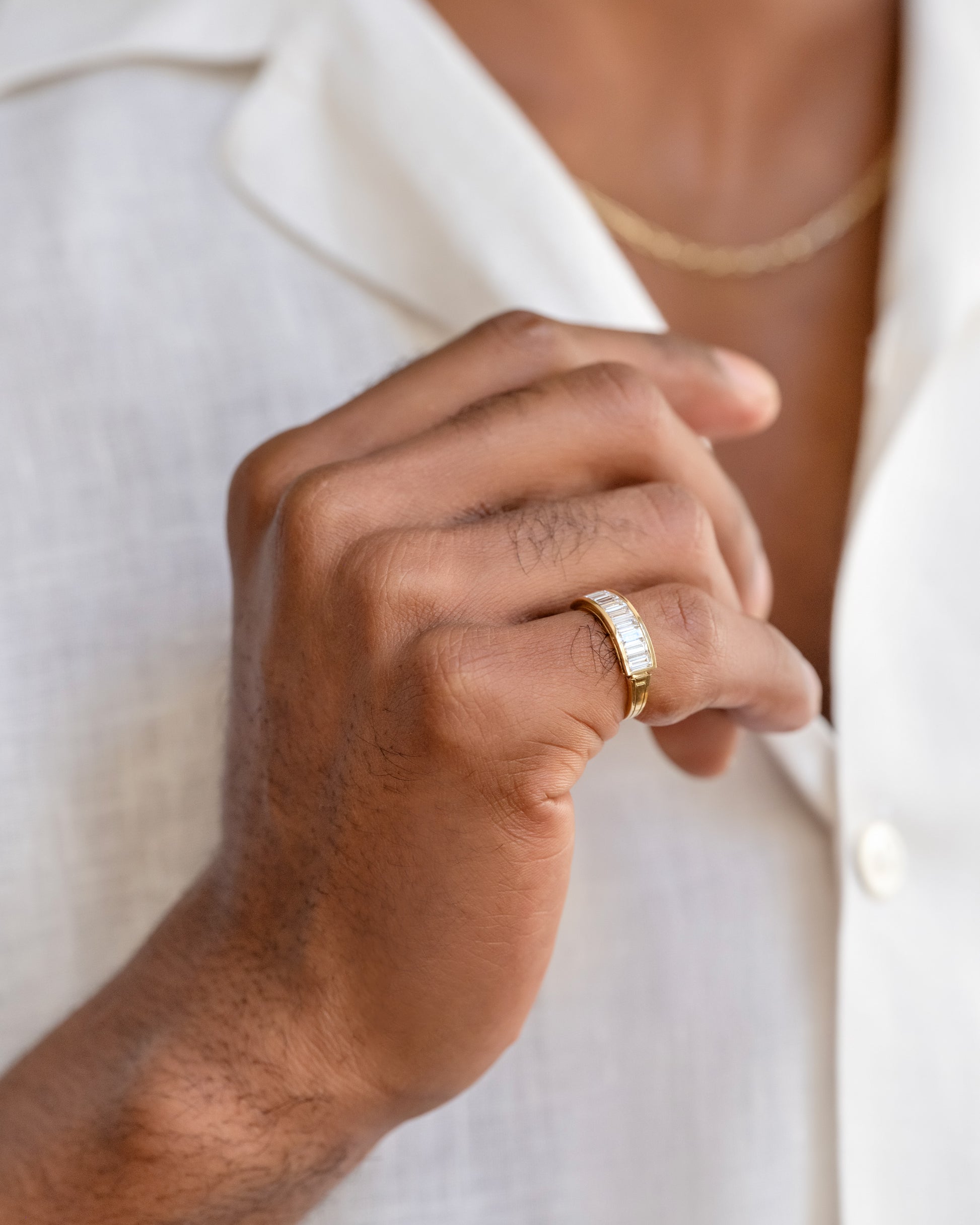 Gold Arcade Ring on male model.