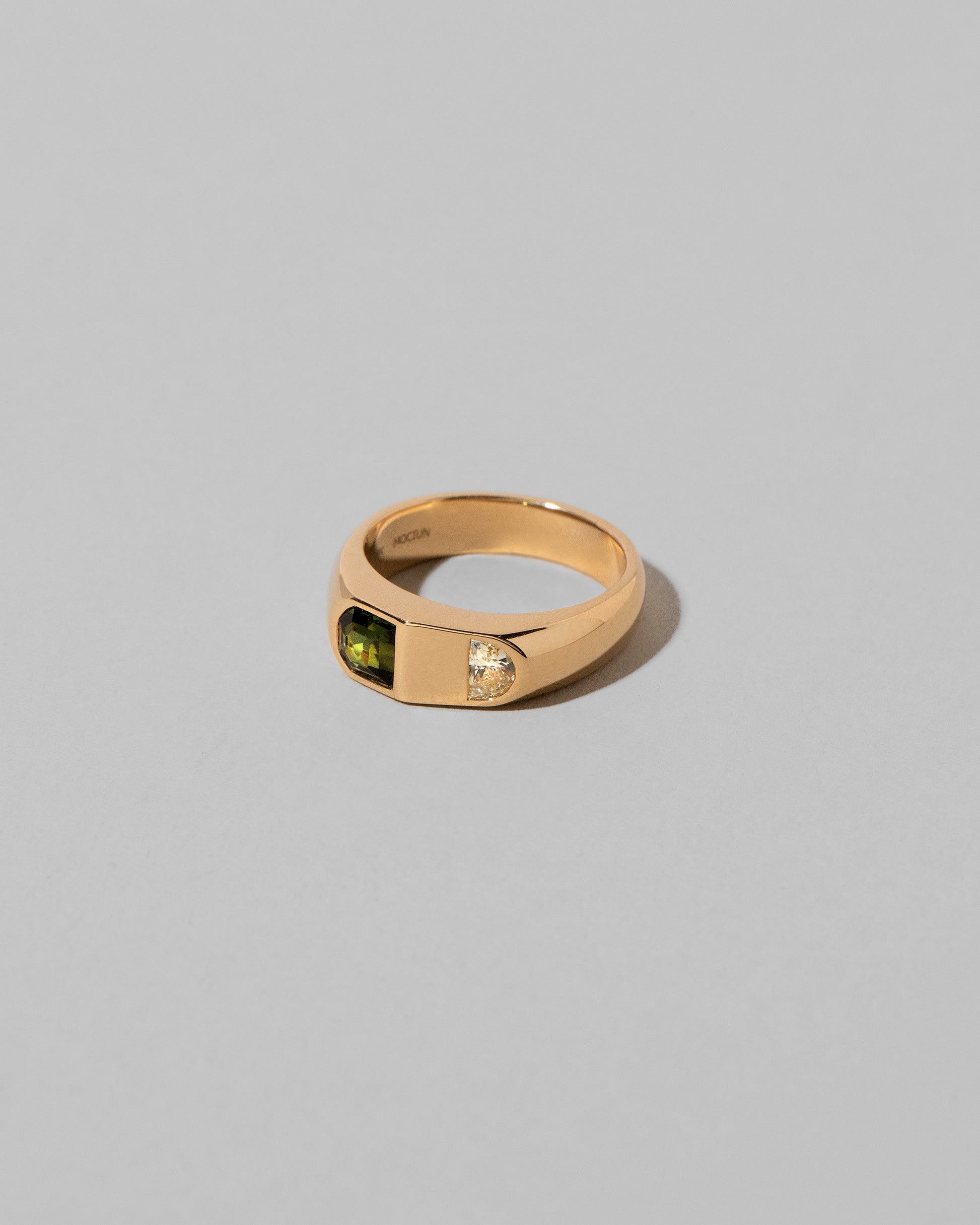 View from the side of the Archway Ring on light color background.