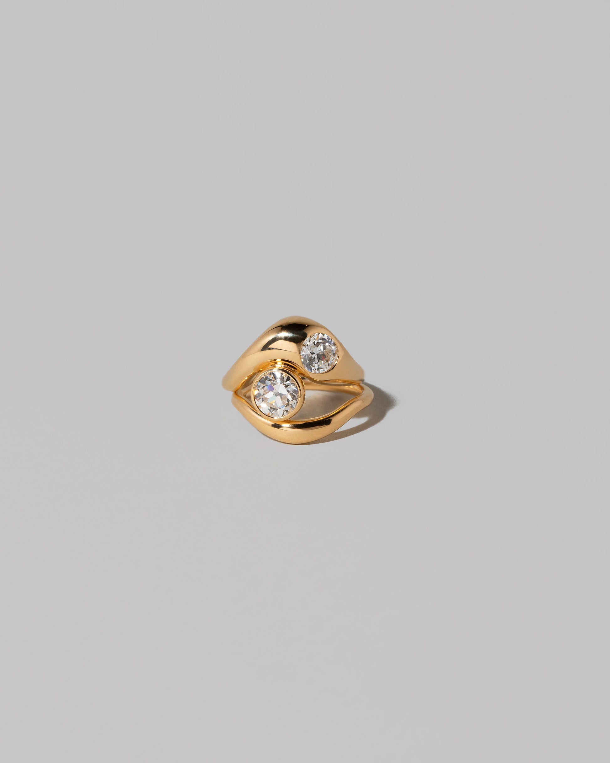 Diamond Two Ring on light color background.