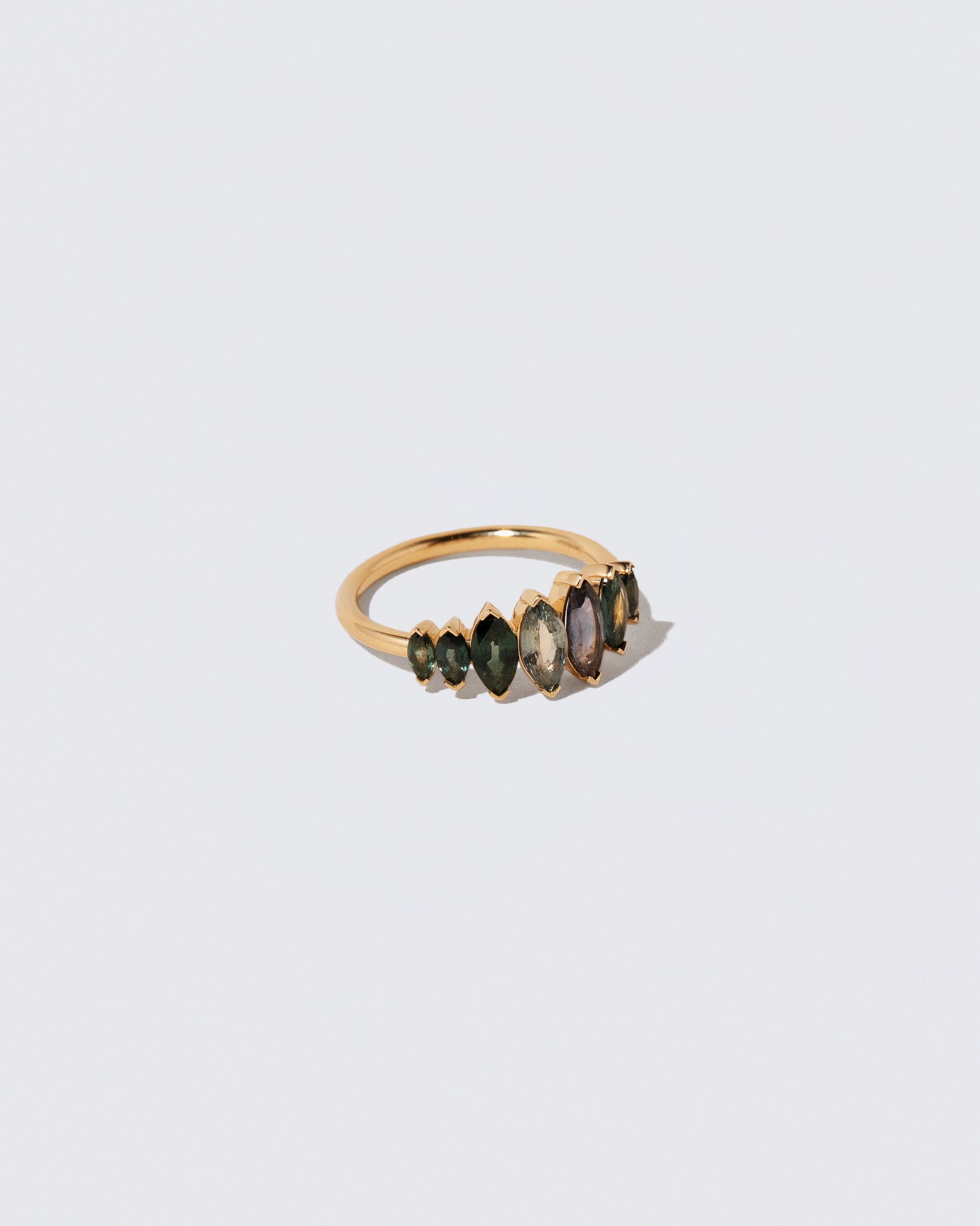 View from the side of the Fritillaria Ring on light color background.