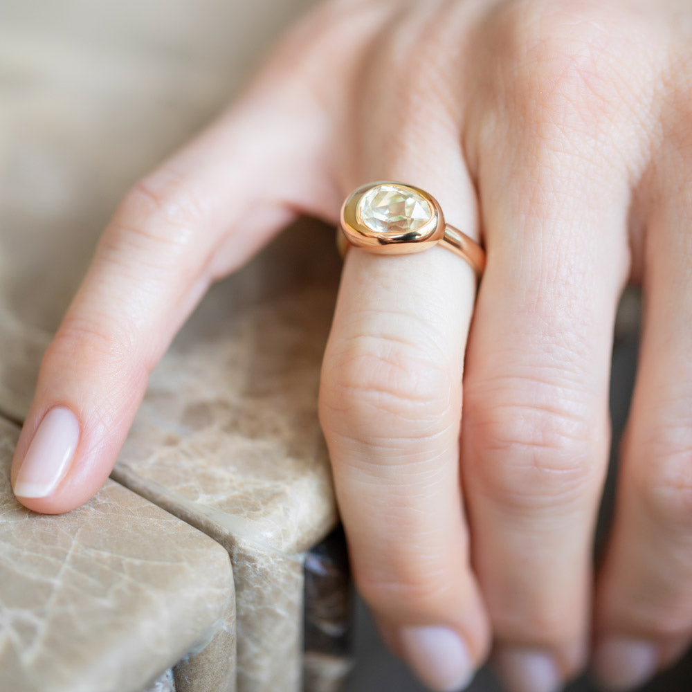 product_details::Sapphire Grand Align Ring on model.