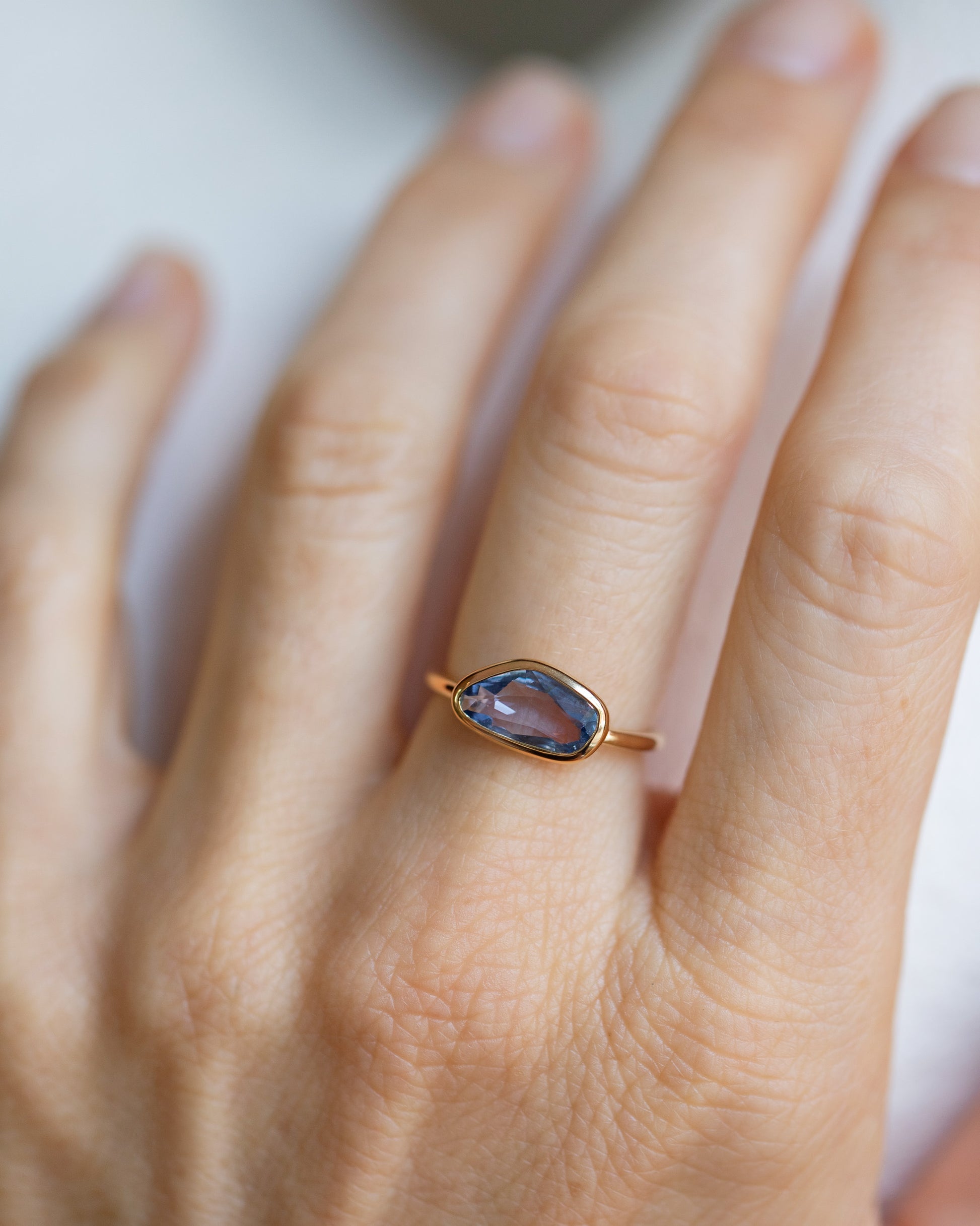 Blue Sapphire Gusher Ring on model.