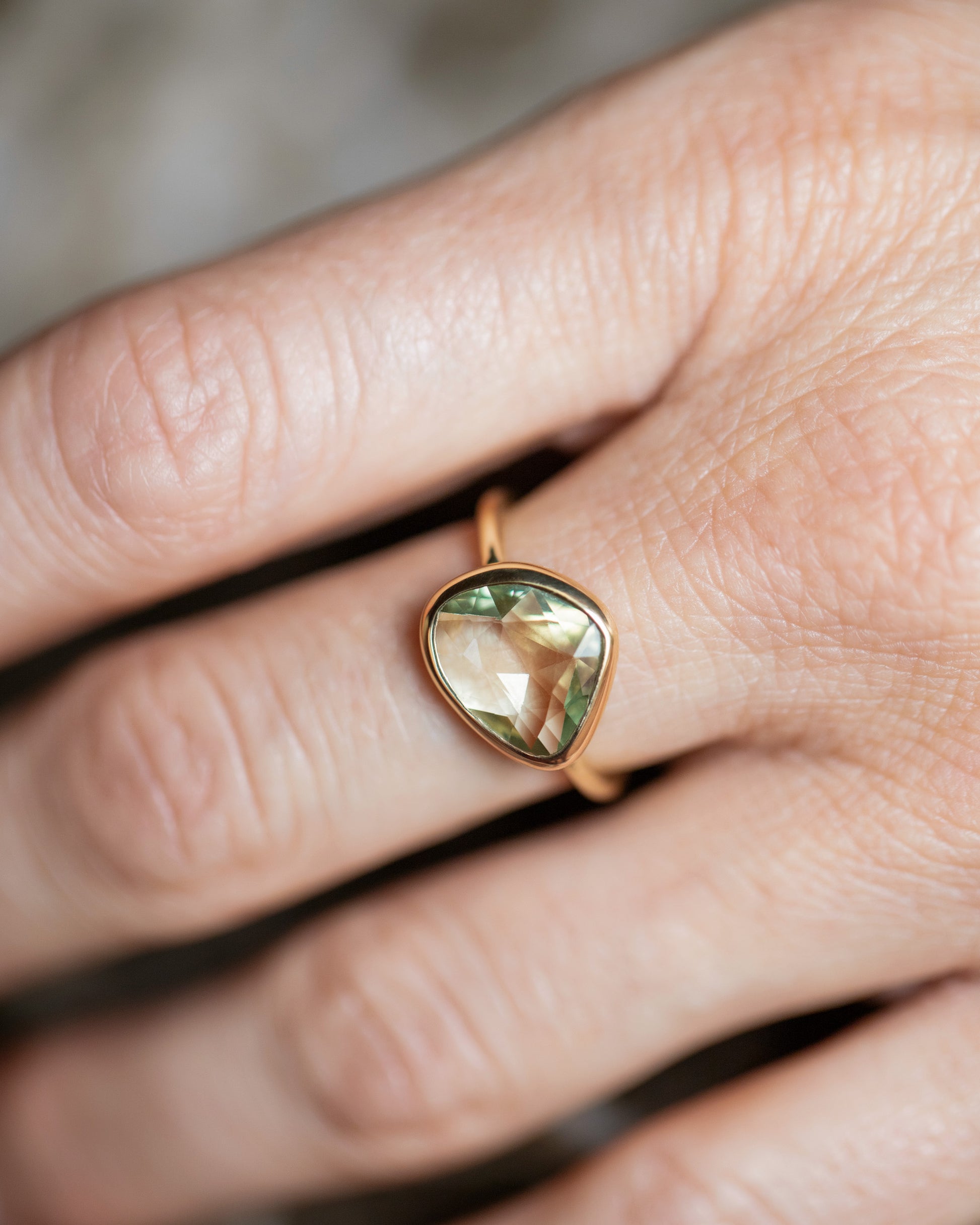 Green Sapphire Gusher Ring on model.