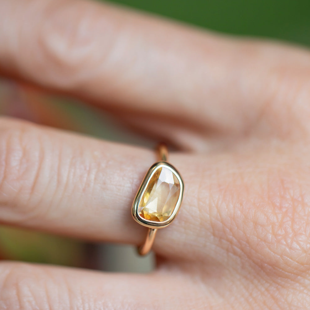 product_details::Yellow Sapphire Gusher Ring on model.