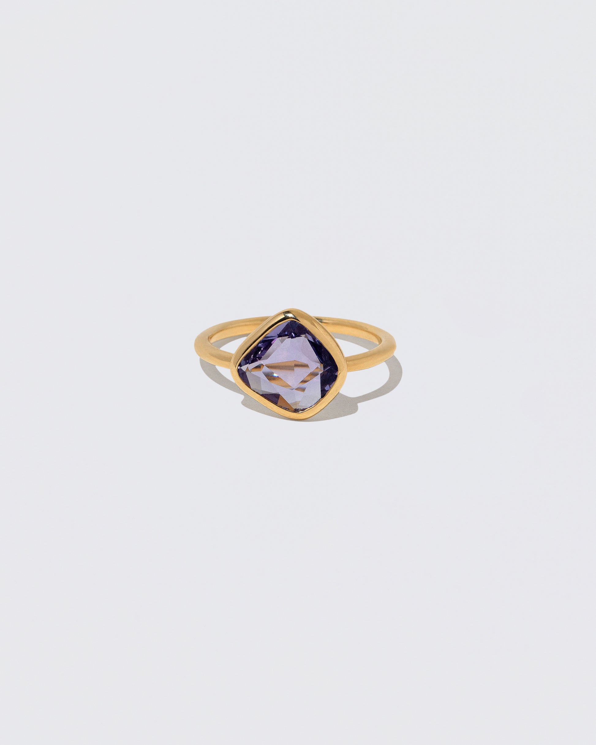 Gusher Purple Sapphire Ring 054 on light color background.