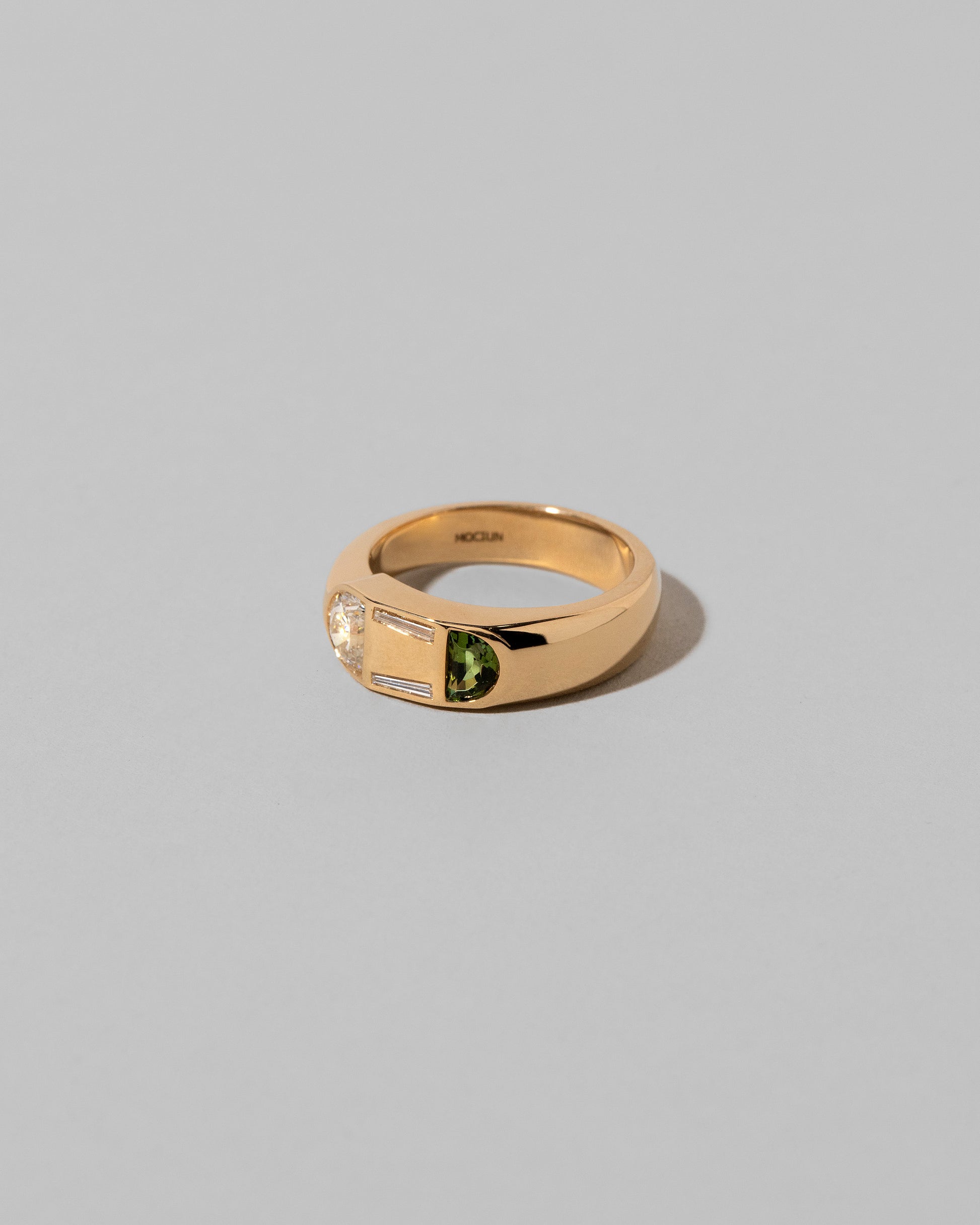 View from the side of the Half Moon Ring on light color background.