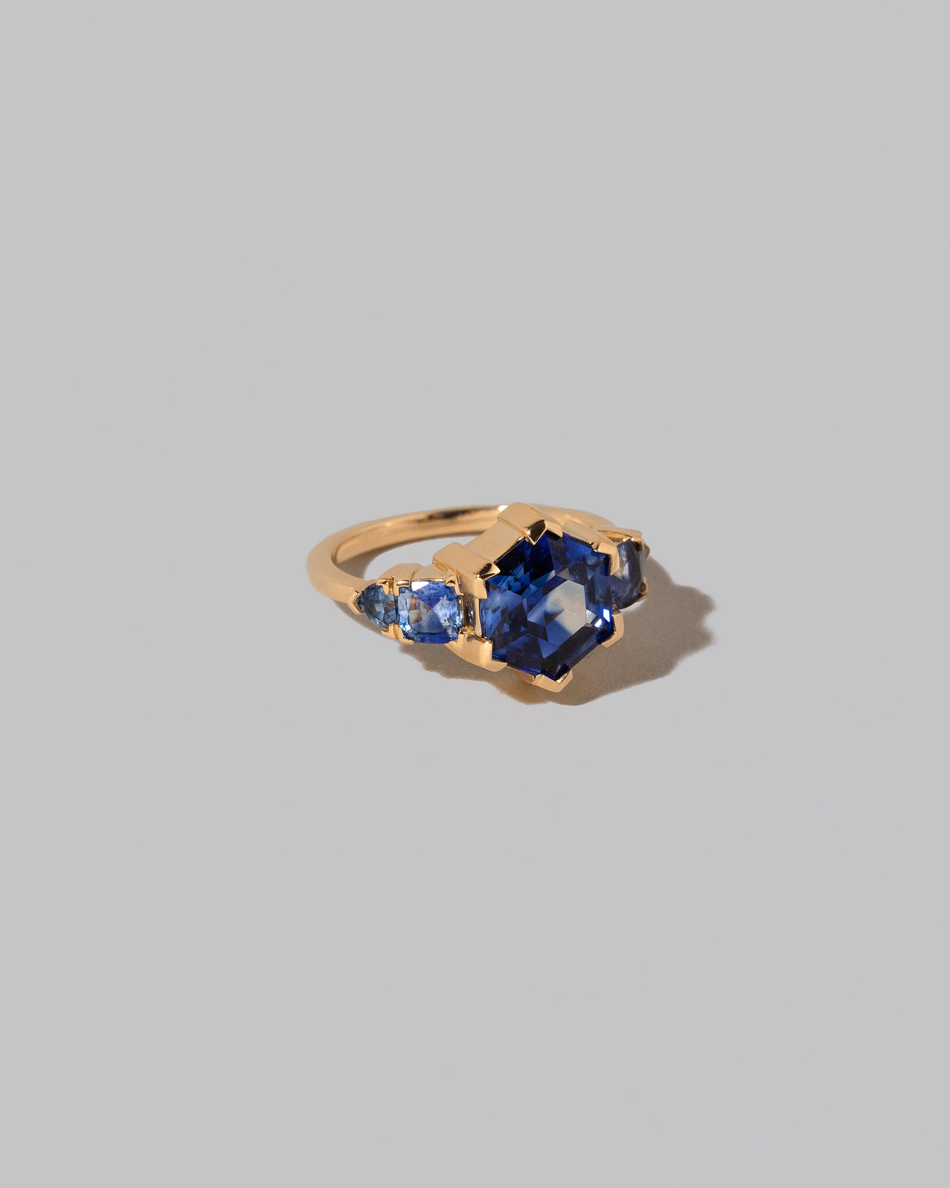 View from the side of the Hyacinthella Ring on light color background.