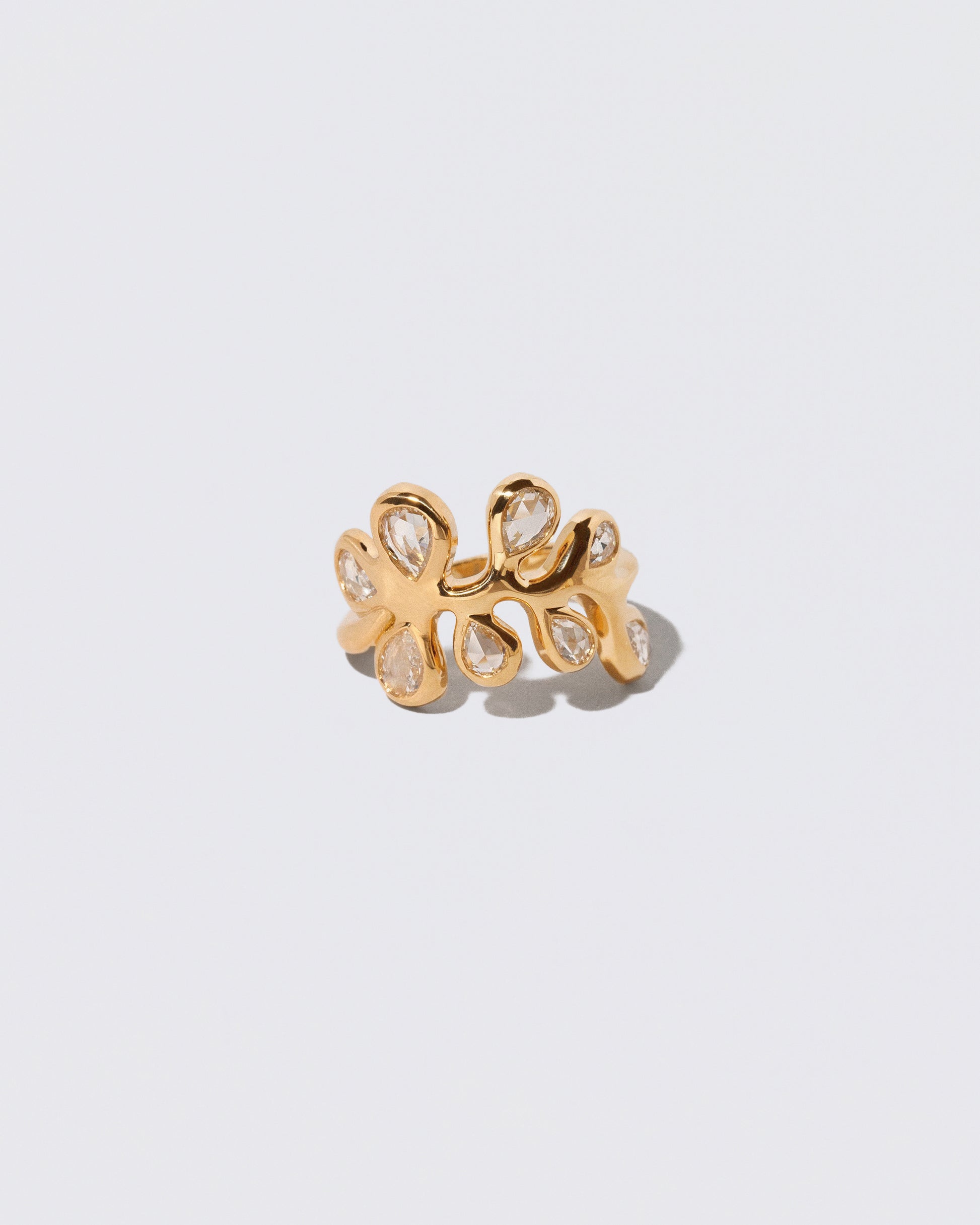 Diamond Palm Ring on light color background.