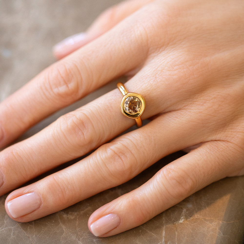product_details::Brown Diamond Poise Ring on model.