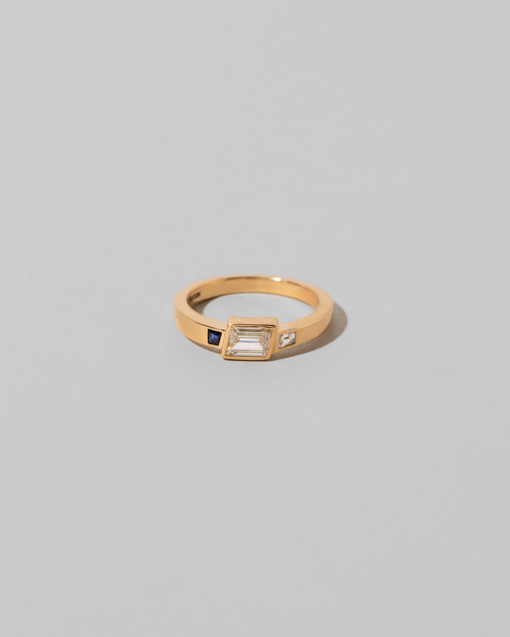 This Way Ring on light color background.
