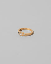 View from the side of the This Way Ring on light color background.