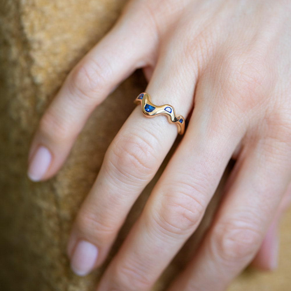 product_details::Sapphire Wild Poppies Band on model.