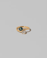 Sapphire & Diamond Union Ring on light color background.