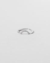 Platinum Pavé Mini Half Hoop Band on light color background.