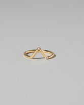 Gold White Diamond Three Stone Triangle Band on light color background.