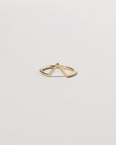 Gold Solid Round Wire Triangle Band on light color background.