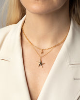 Large Verve Five Point Star Charm and Small Six Point Star Charms on model.