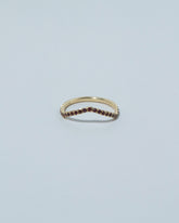 Gold Garnet Low Peak Band on light color background.