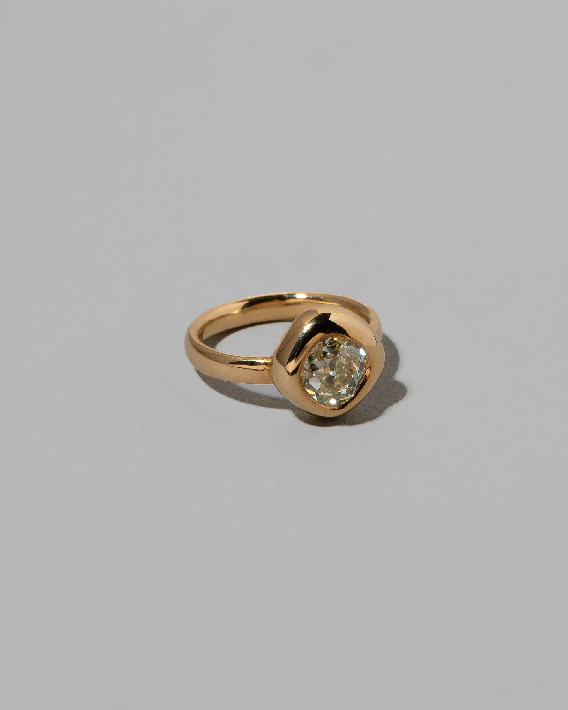 View from the side of the Balanced Ring on light color background.