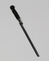 Santa Fe Stoneworks Black Buffalo Turquoise Bread Knife on light color background.