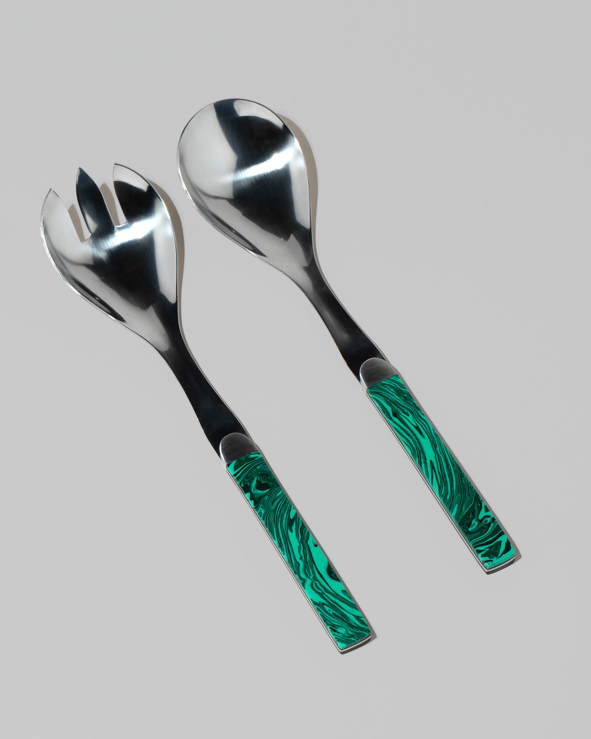 Santa Fe Stoneworks True Stone Malachite Salad Serving Set on light color background.