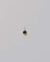 Bicolor Sapphire Pendant on light color background.